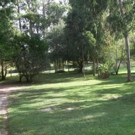Buy this 4 bed house on Camino Lussich 22 in 20000 Barrio Los Aromos, Uruguay