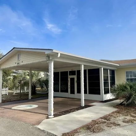 Buy this studio apartment on 1842 Kingfisher Dr in Surfside Beach, South Carolina