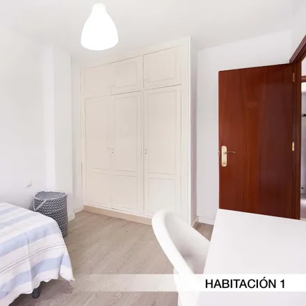 Rent this 4 bed room on Calle Porvenir in 41005 Seville, Spain