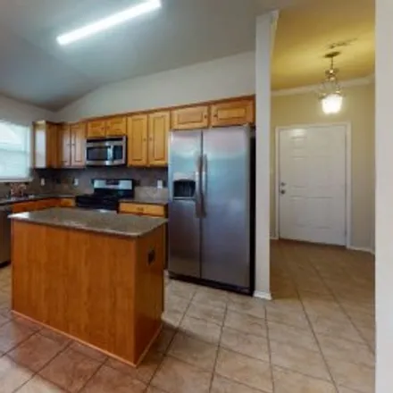 Rent this 3 bed apartment on 922 Whitewing Lane in Dove Crossing, College Station