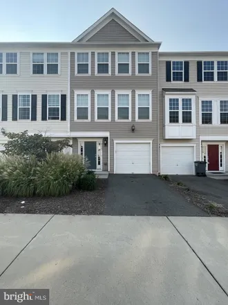 Rent this 4 bed townhouse on 14229 Heritage Crossing Lane in Centreville, VA 20120