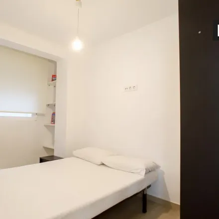 Rent this 4 bed room on Instal·lació Esportiva Elemental La Creu del Grau in Carrer de Menorca, 46024 Valencia