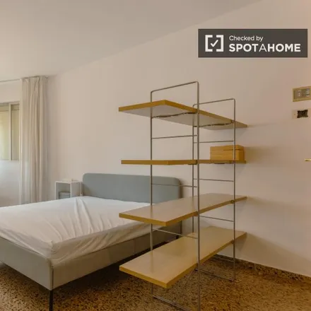 Rent this 4 bed room on Centro Cultural Islámico de Valencia in Carrer del Palància, 46021 Valencia