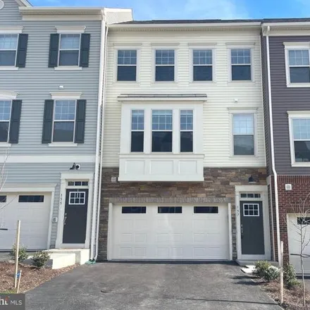 Rent this 4 bed townhouse on 215 Independence Lane in Garrisonville, VA 22554