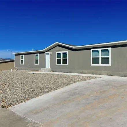 Buy this studio apartment on 1754 Desert Vista Drive in Espanola, NM 87532