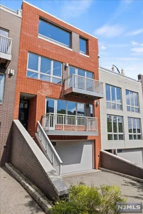 Rent this 4 bed townhouse on 3 Vela Way in Edgewater, Bergen County