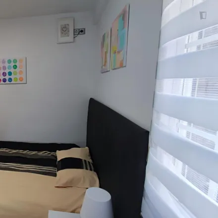 Rent this 2 bed room on Lavar & Go in Calle de Andrea Doria, 5