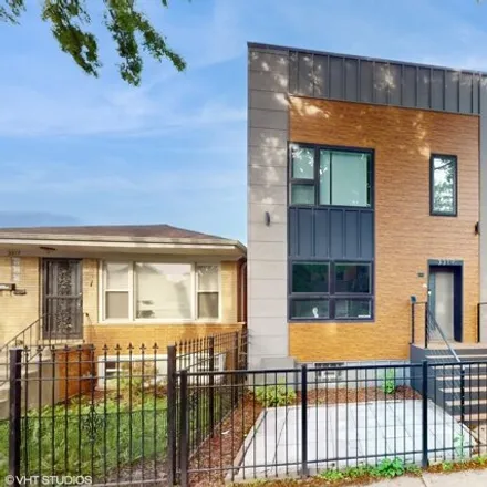 Buy this 3 bed house on 3319 South Racine Avenue in Chicago, IL 60608