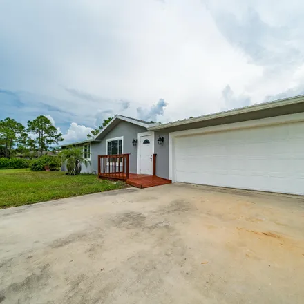 Buy this 3 bed house on 12515 67th Street North in Palm Beach County, FL 33412