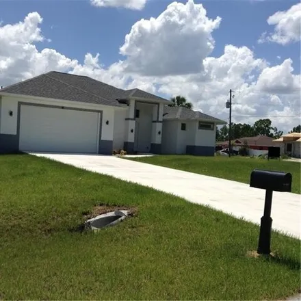 Buy this 3 bed house on 1199 Capp Avenue in Lehigh Acres, FL 33971