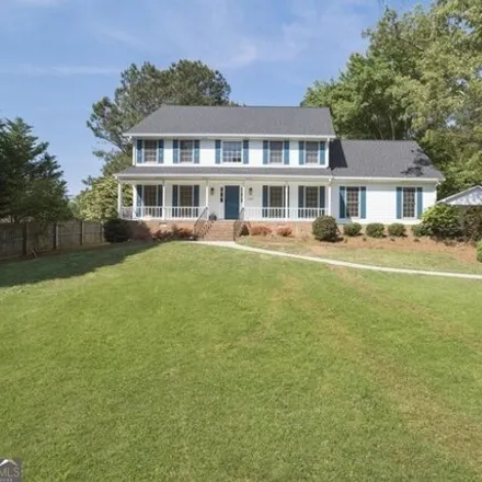 Rent this 3 bed house on 1387 Springside Court in Five Forks, GA 30078