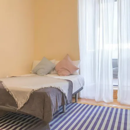 Rent this 9 bed room on Madrid in Madrid Ramos Sierra, Calle de Ferraz