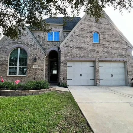 Rent this 4 bed house on 29488 Wood Lily Drive in Fort Bend County, TX 77494