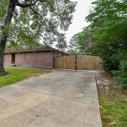 Rent this 4 bed house on 672 Andover Street in Harris County, TX 77373
