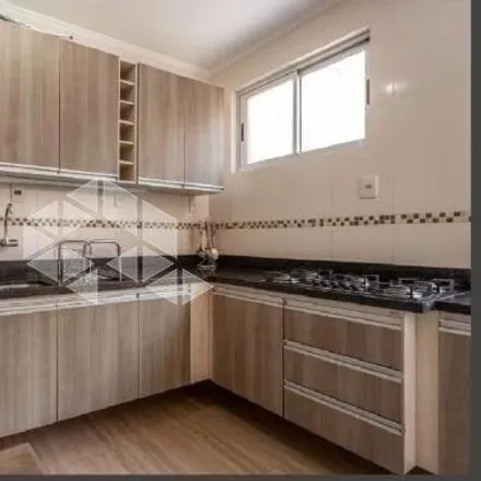 Buy this 3 bed apartment on Colégio Estadual Piratini in Rua Eudoro Berlink 632, Auxiliadora