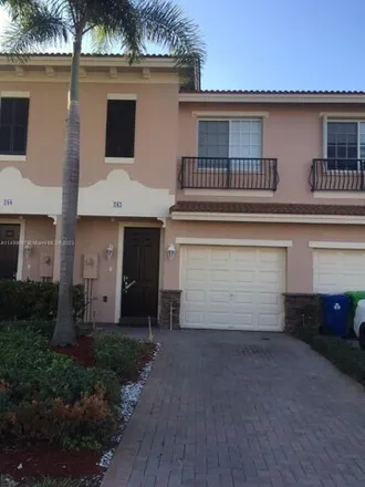 Rent this 3 bed townhouse on 246 Las Brisas Circle in Sunrise, FL 33326