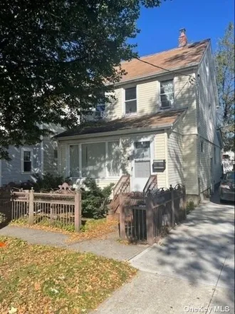 Buy this 6 bed house on 164-33 77th Ave in Flushing, New York
