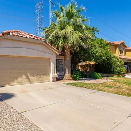 Rent this 3 bed house on 1426 East Hearne Way in Gilbert, AZ 85234