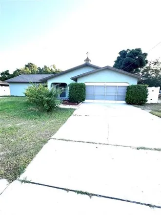 Buy this 3 bed house on 5047 Elwood Road in Spring Hill, FL 34608