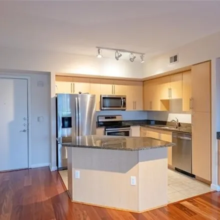Rent this 2 bed condo on 54 Rainey Street in Austin, TX 78701