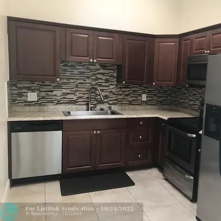Rent this 2 bed duplex on 11243 Northwest 39th Street in Coral Springs, FL 33065