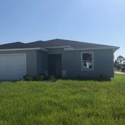 Buy this 4 bed house on Parkman Avenue in Lehigh Acres, FL 33976