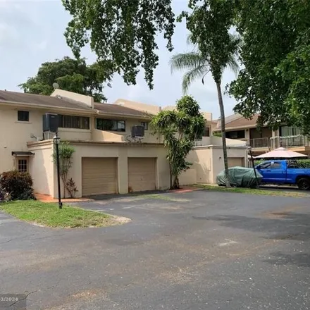 Buy this 2 bed townhouse on 7573 Stirling Road in Davie, FL 33024