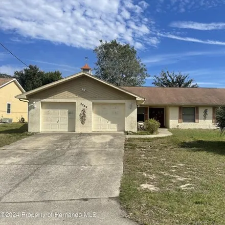 Buy this 3 bed house on 2446 Keeport Drive in Spring Hill, FL 34609