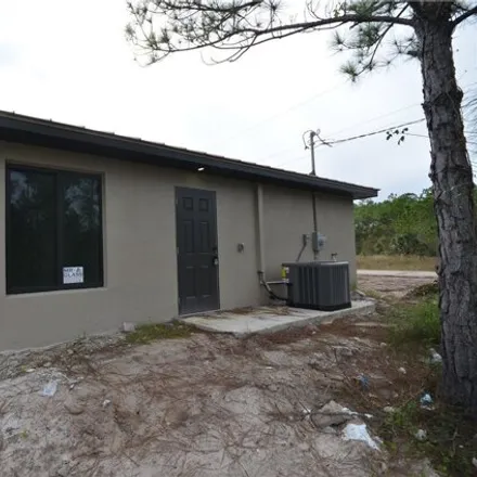 Image 5 - 3301 Nora Avenue North, Lehigh Acres, FL 33971, USA - House for sale