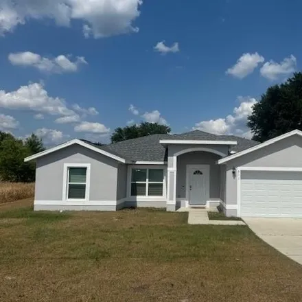 Rent this 3 bed house on 237 Locust Pass Course in Marion County, FL 34472