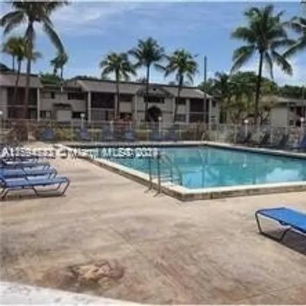 Rent this 3 bed condo on 451 Northeast 207th Lane in Miami-Dade County, FL 33179