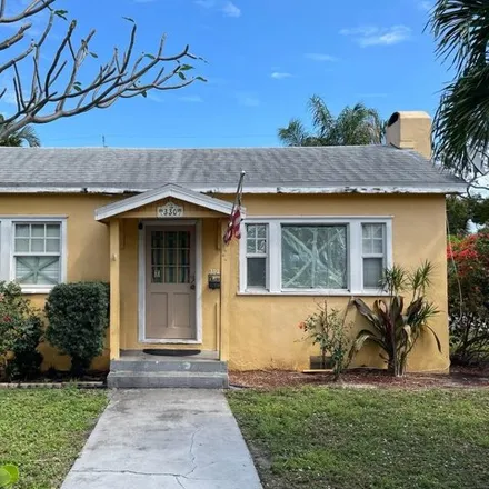 Buy this 4 bed house on Historic district sign in 4th Avenue South, Lake Worth Beach