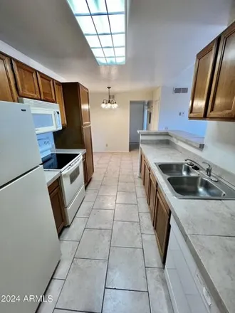 Rent this 2 bed apartment on 627 West Guadalupe Road in Mesa, AZ 85210
