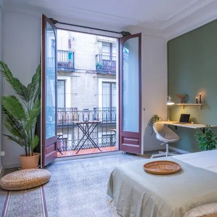 Rent this 6 bed room on Happy Apartments in Carrer Nou de la Rambla, 08001 Barcelona