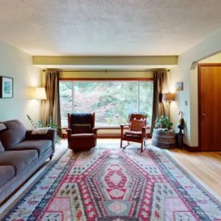 Buy this 3 bed apartment on 6116 Southwest 47Th Avenue in Southwest Portland, Portland