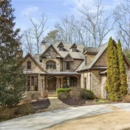 Buy this 6 bed house on 4980 High Point Rd in Sandy Springs, Georgia