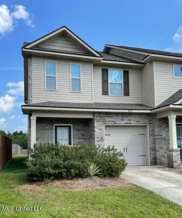 Rent this 3 bed townhouse on 873 Reunion Place Circle in Biloxi, MS 39532
