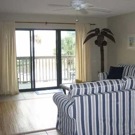 Rent this 2 bed townhouse on FL