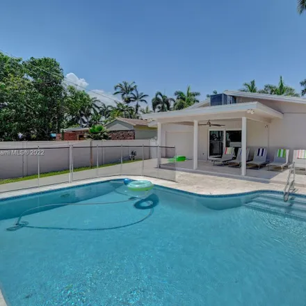 Rent this 4 bed house on 932 Polk Street in Hollywood, FL 33019