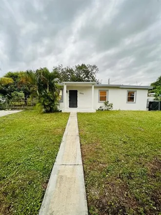 Rent this 3 bed house on 2335 West Bunche Park Drive in Bunche Park, Miami Gardens