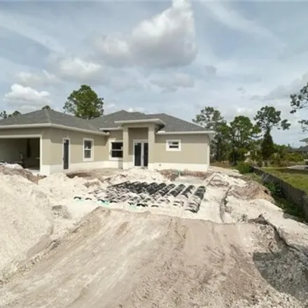 Buy this 3 bed house on 3398 8th Street Southwest in Lehigh Acres, FL 33976