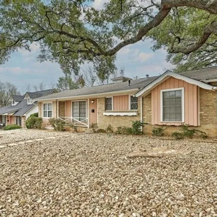 Rent this 4 bed house on 2707 East Side Drive in Austin, TX 78704