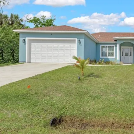 Buy this 3 bed house on 1192 Harper Boulevard Southwest in Palm Bay, FL 32908