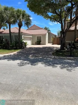 Rent this 4 bed house on 7700 Northwest 61st Terrace in Parkland, FL 33067