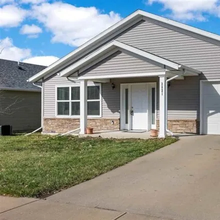 Buy this 4 bed house on 2821 Whispering Meadow Drive in Iowa City, IA 52240