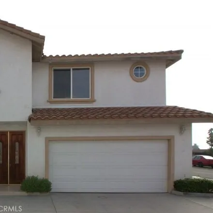Rent this 4 bed townhouse on 488 East Puente Street in Covina, CA 91723