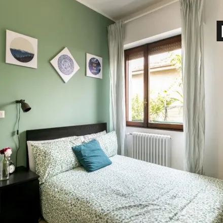 Rent this 4 bed room on Via Dalmagià in 20157 Milan MI, Italy