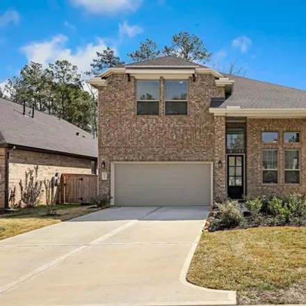 Buy this 4 bed house on Silver Carp Trail in Conroe, TX 77305