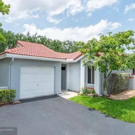 Buy this 3 bed house on 1401 Seagrape Circle in Weston, FL 33326