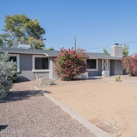 Rent this 4 bed house on 1738 East Catalina Drive in Phoenix, AZ 82158